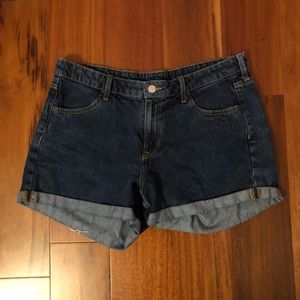 Mid-high rise dark wash cuffed shorts